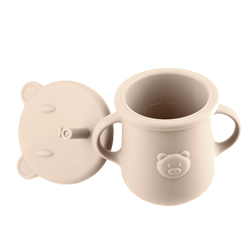 Prikaži podrobnosti za Silikonska skodelica s slamico in ročajem Retter Mjolk Slika Silikonska skodelica s slamico in ročajem Retter Mjolk